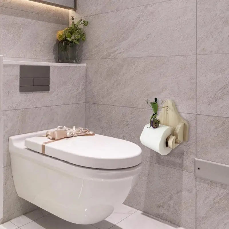 | BathroomBuddy™ - Frog riding bicycle toilet roll holder