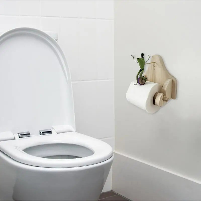 | BathroomBuddy™ - Frog riding bicycle toilet roll holder
