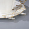 | Cross-shaped curved earrings