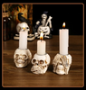 | Skullight 3pc Halloween Skull Candle Holder Set